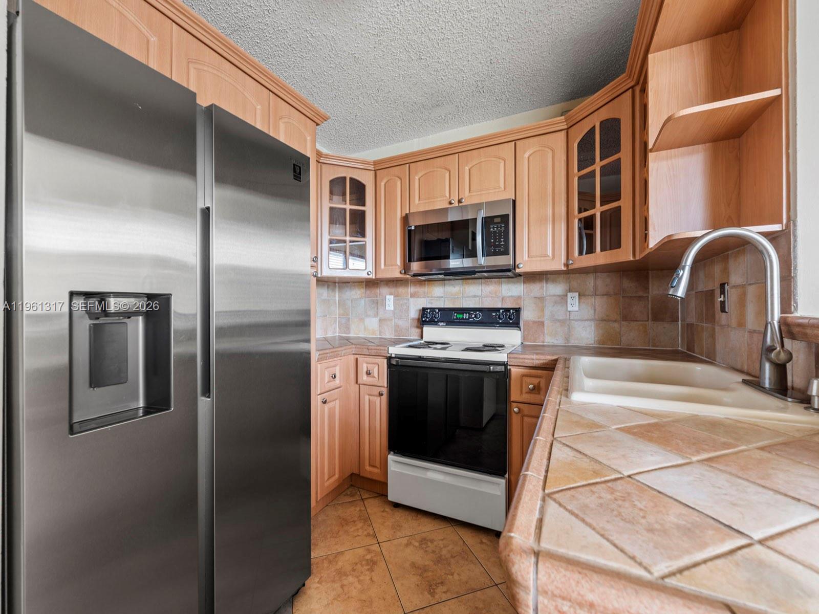 10020 NW 9th St Cir # 202