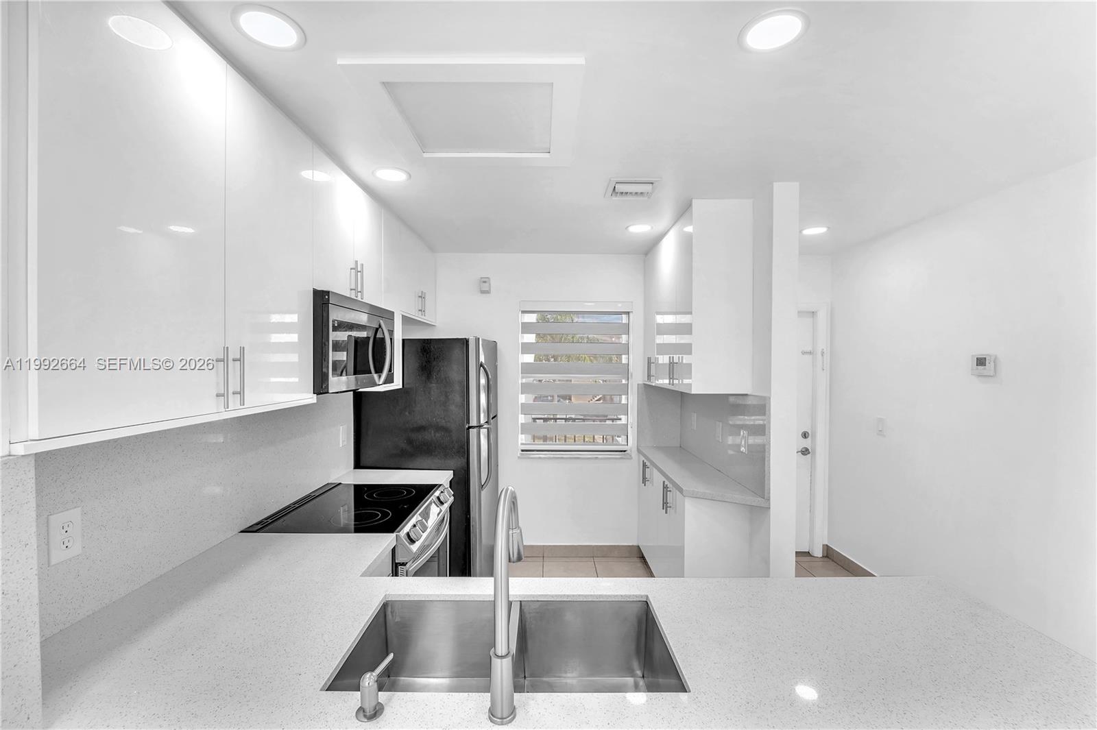 7668 SW 152nd Ave # 211 Unit: 2-211