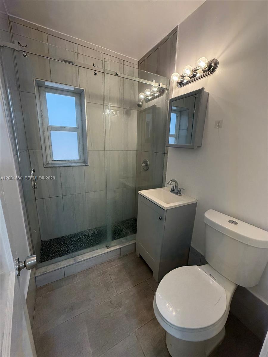 7712 NE 1st Ct Unit: -