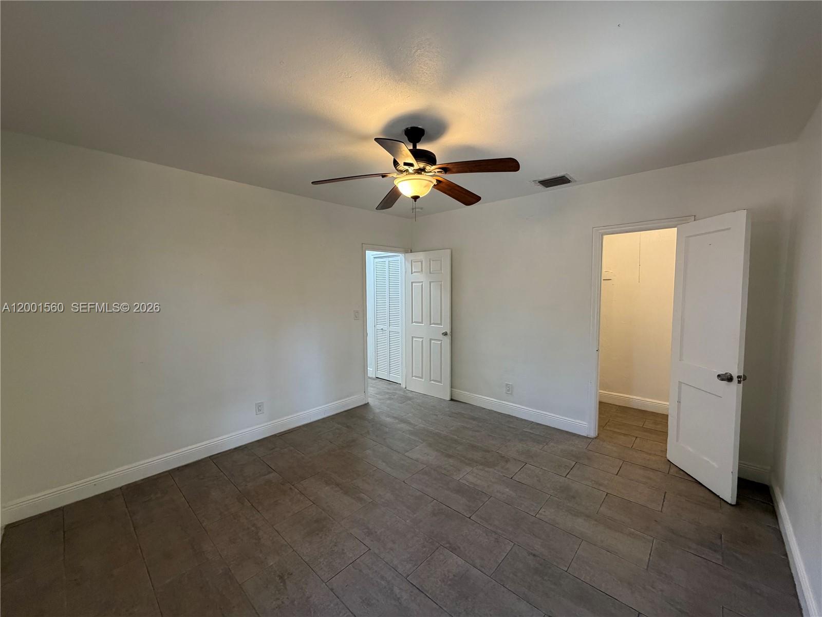 7712 NE 1st Ct Unit: -