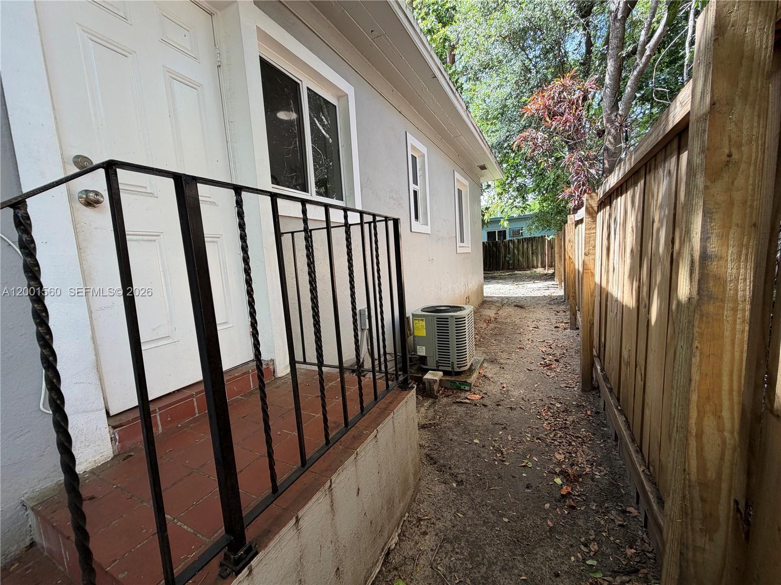 7712 NE 1st Ct Unit: -