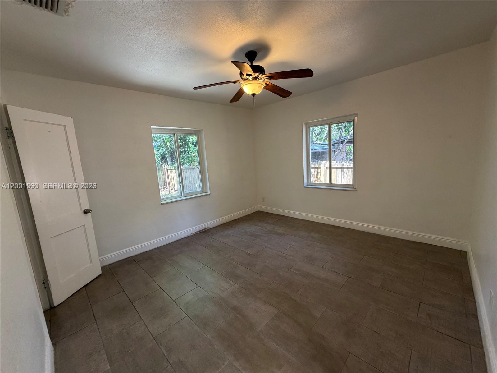 7712 NE 1st Ct Unit: -