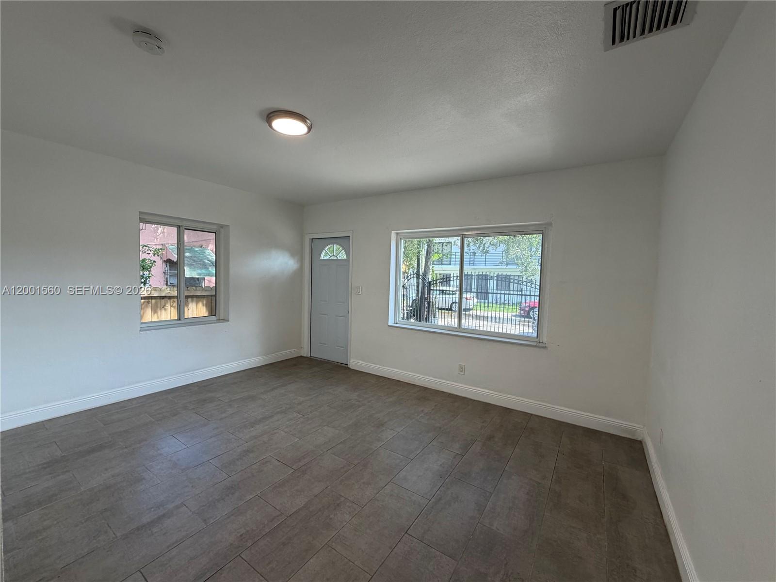 7712 NE 1st Ct Unit: -
