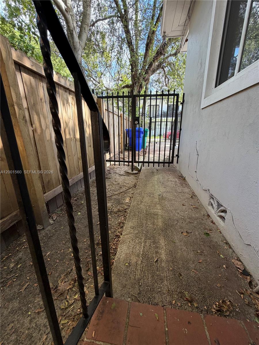 7712 NE 1st Ct Unit: -