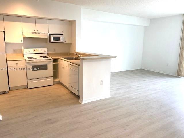 5077 NW 7th St # 807
