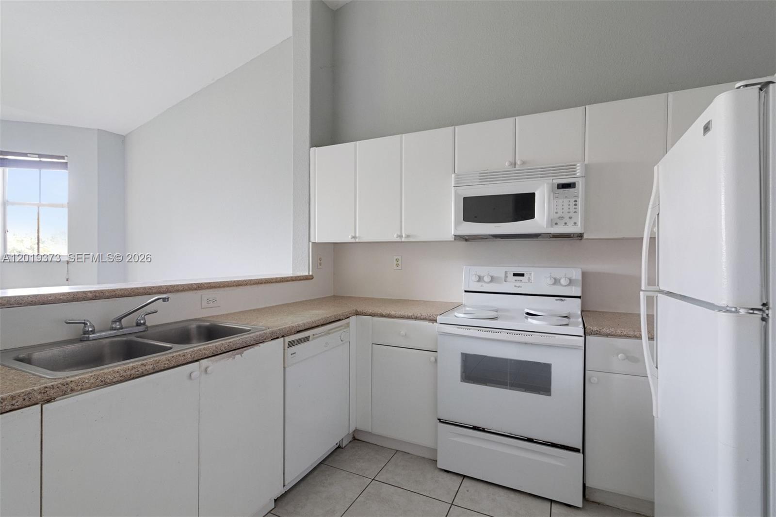 1568 SE 26th St # 203
