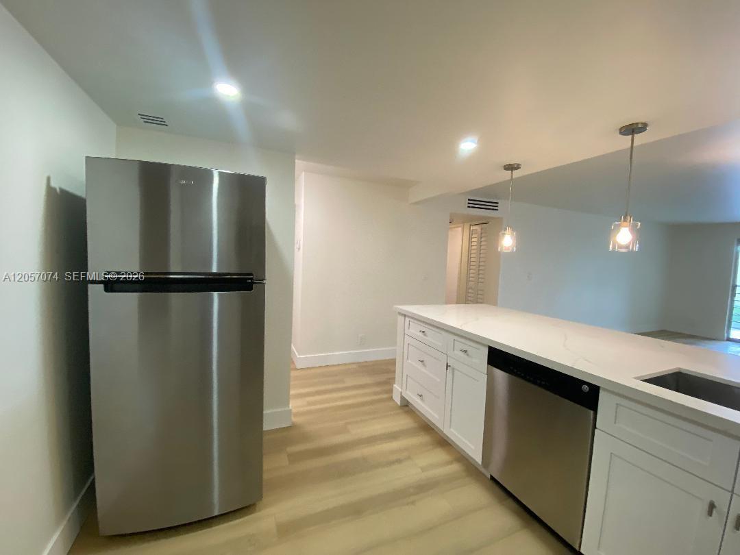 401 SE 3rd St # 405