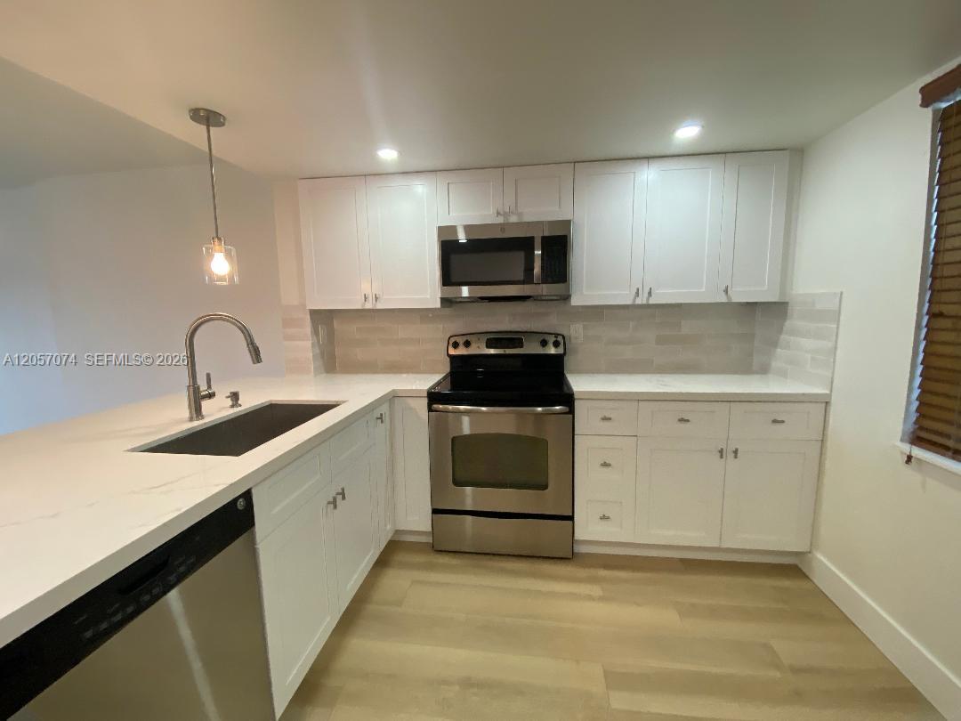 401 SE 3rd St # 405