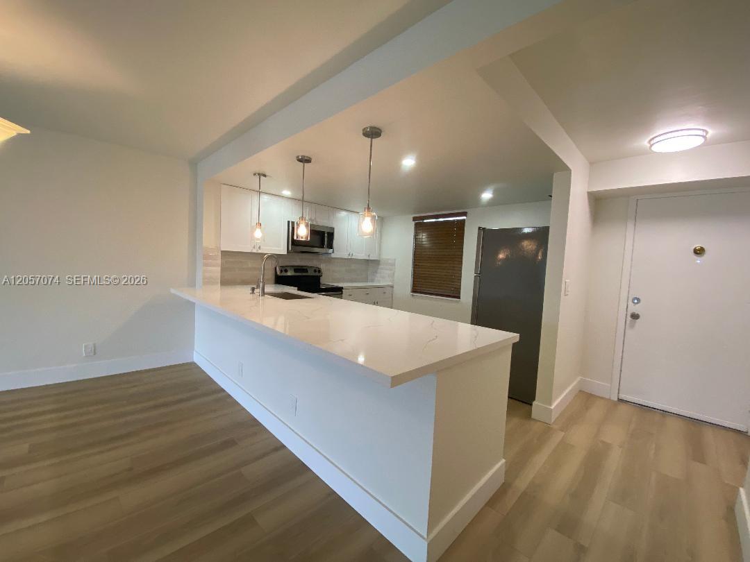 401 SE 3rd St # 405