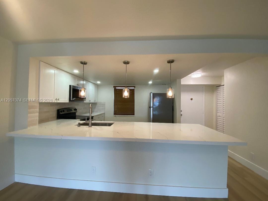 401 SE 3rd St # 405