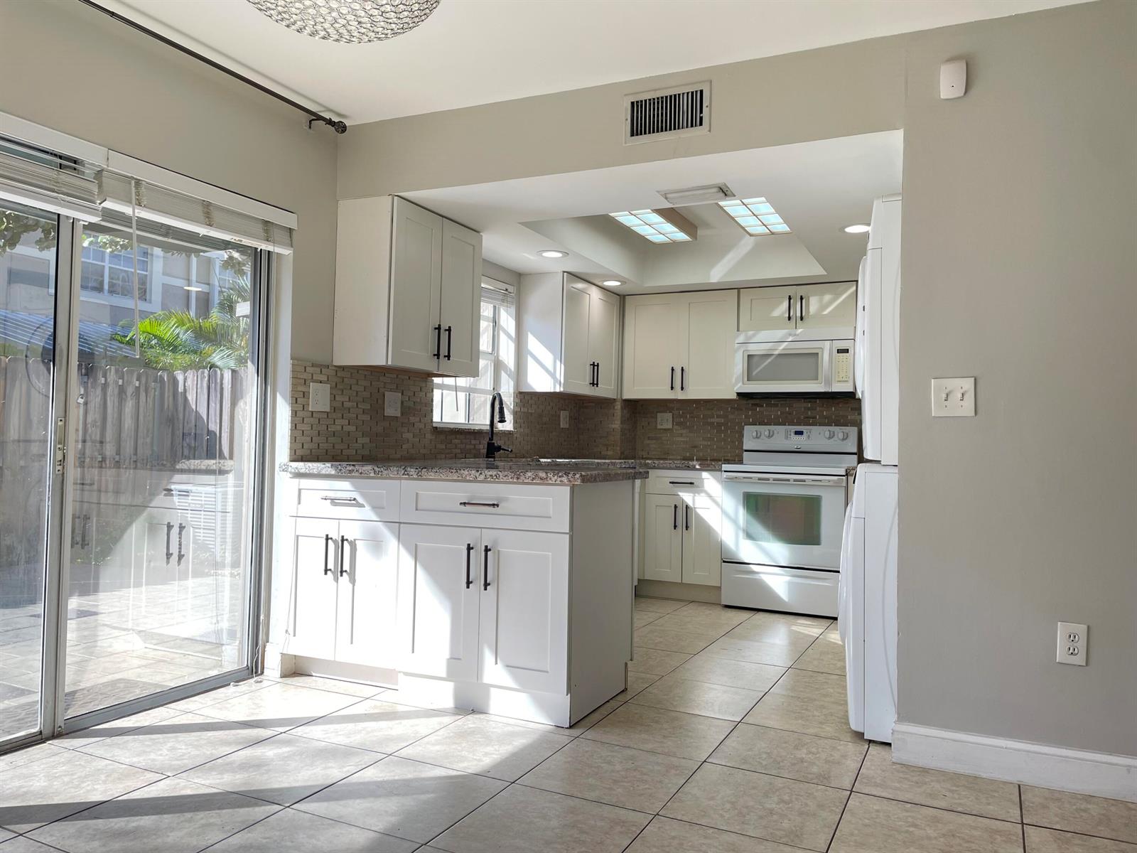 12366 SW 51st Place