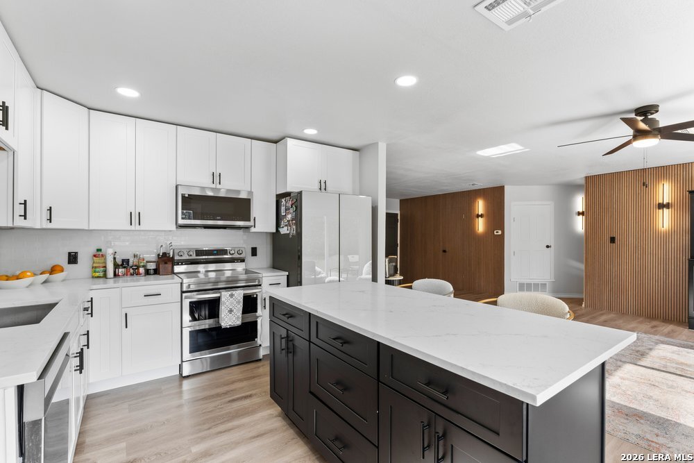 9823 John Rolfe Dr