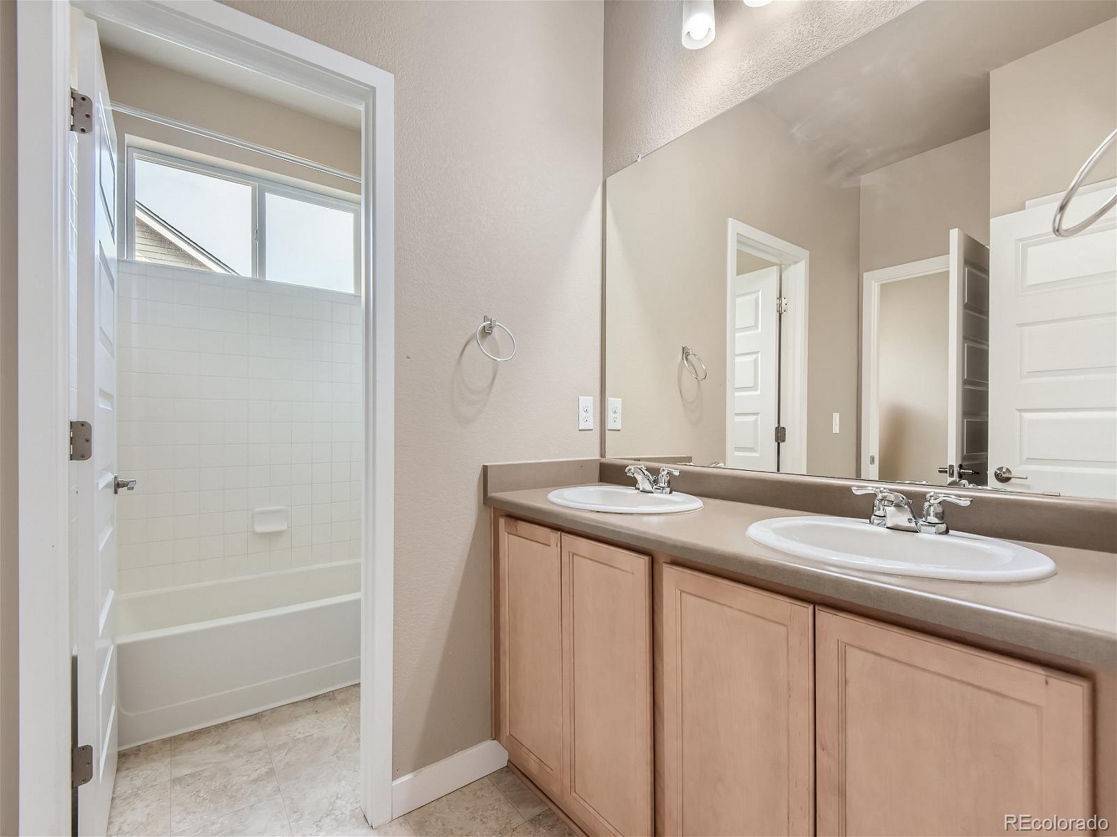 7718 E Academy Place