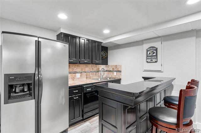 5977 S Zenobia Court