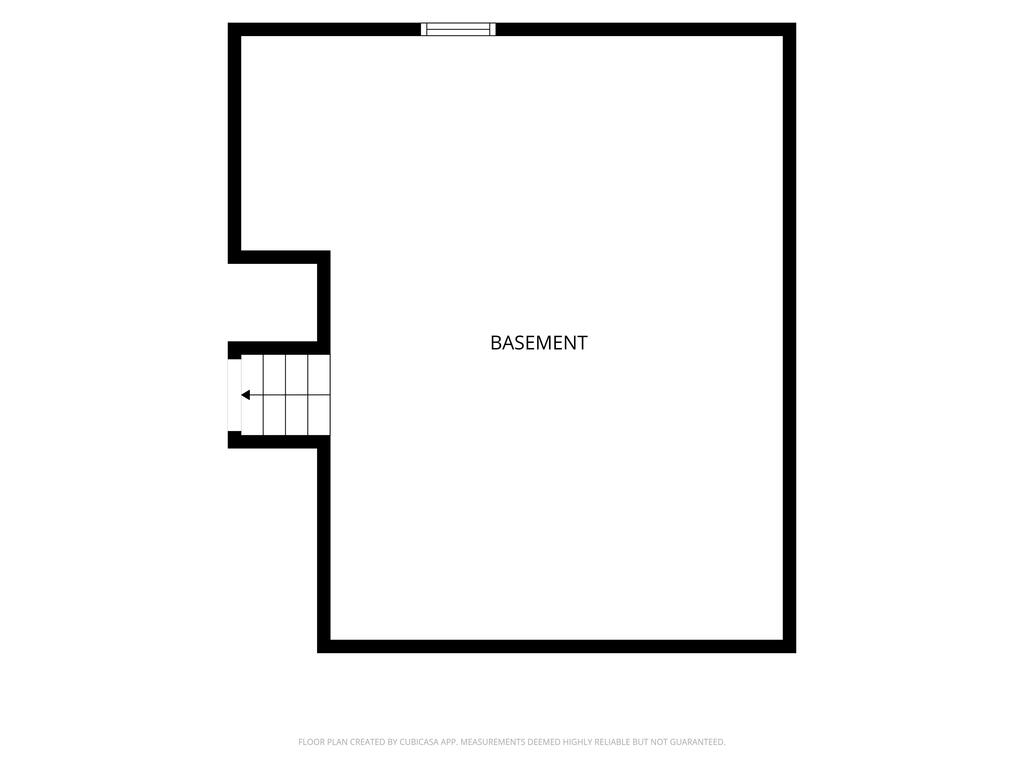 Basement floor plan with a large open area and stairs along the left side.