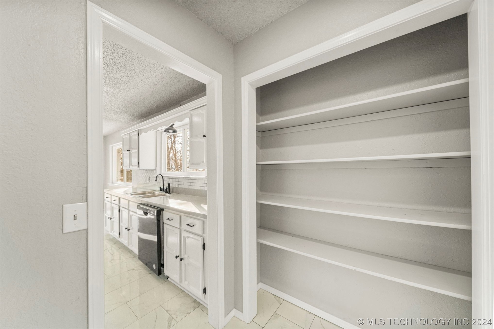 12008 E 88th Place N