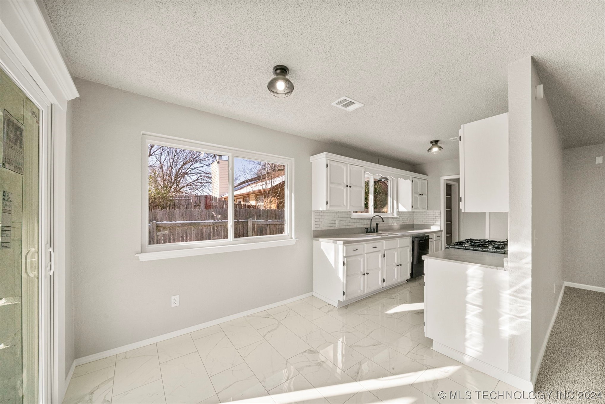 12008 E 88th Place N