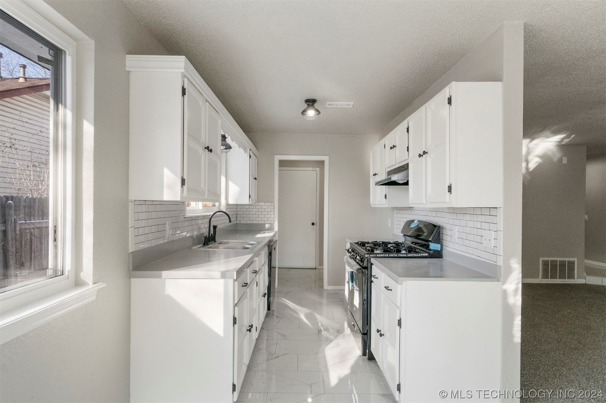 12008 E 88th Place N