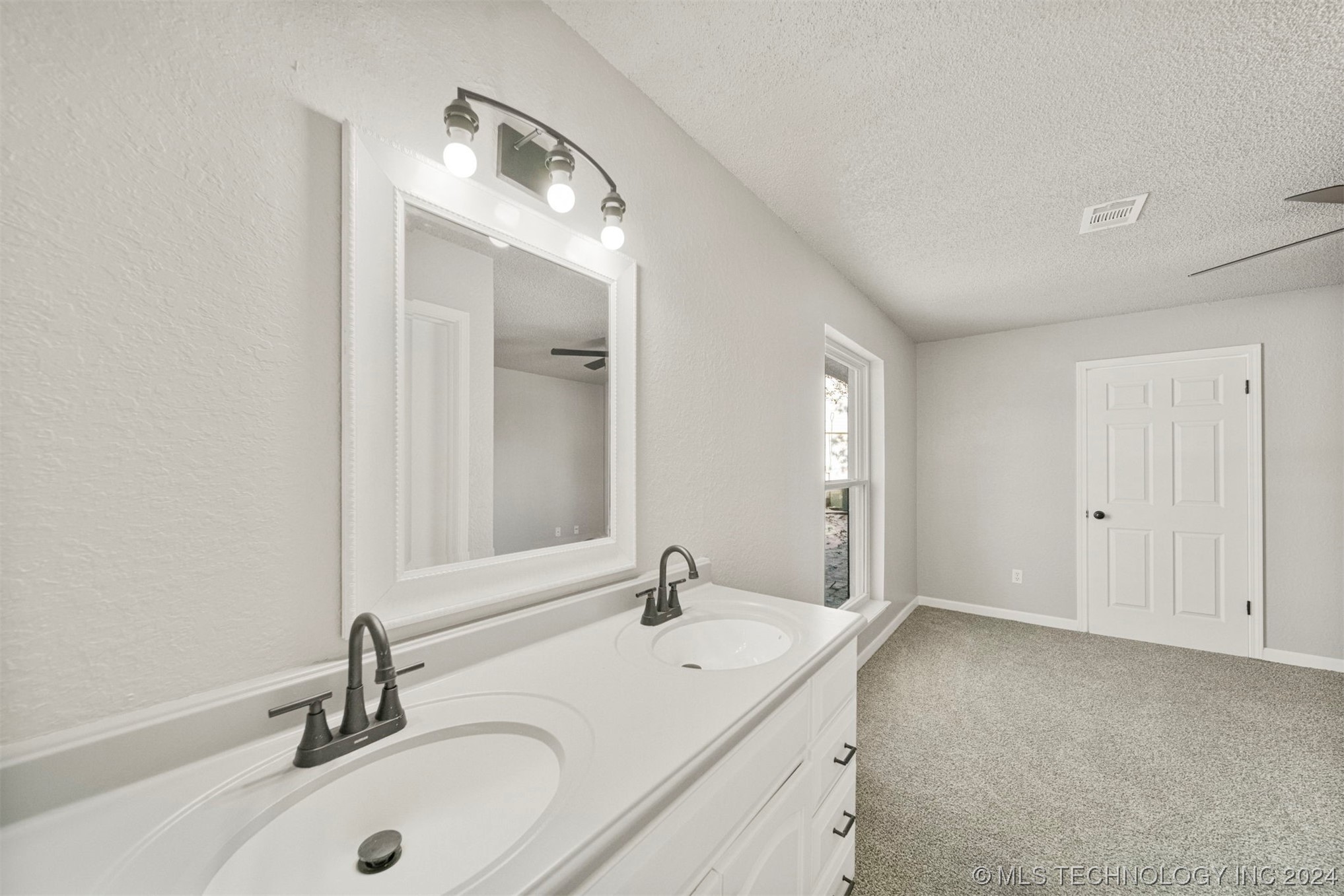 12008 E 88th Place N