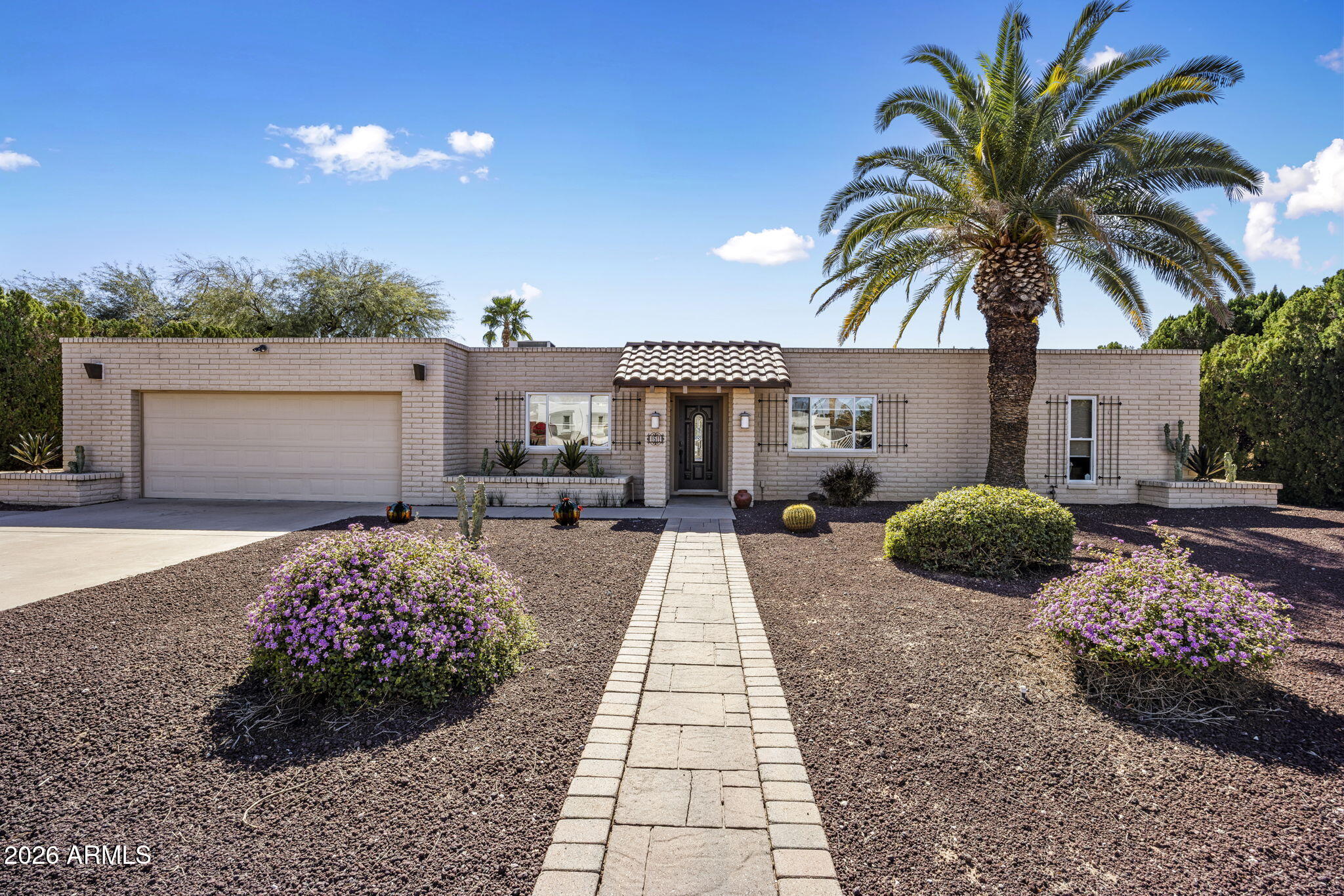 6511 E VOLTAIRE Avenue