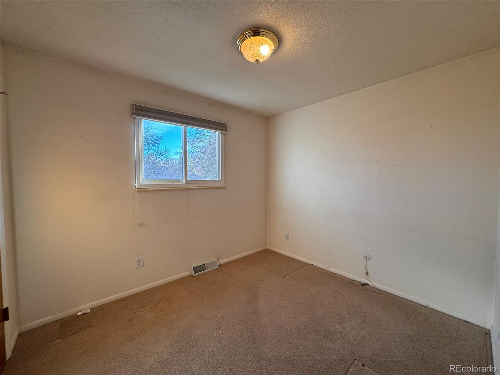 7034 W Roxbury Place