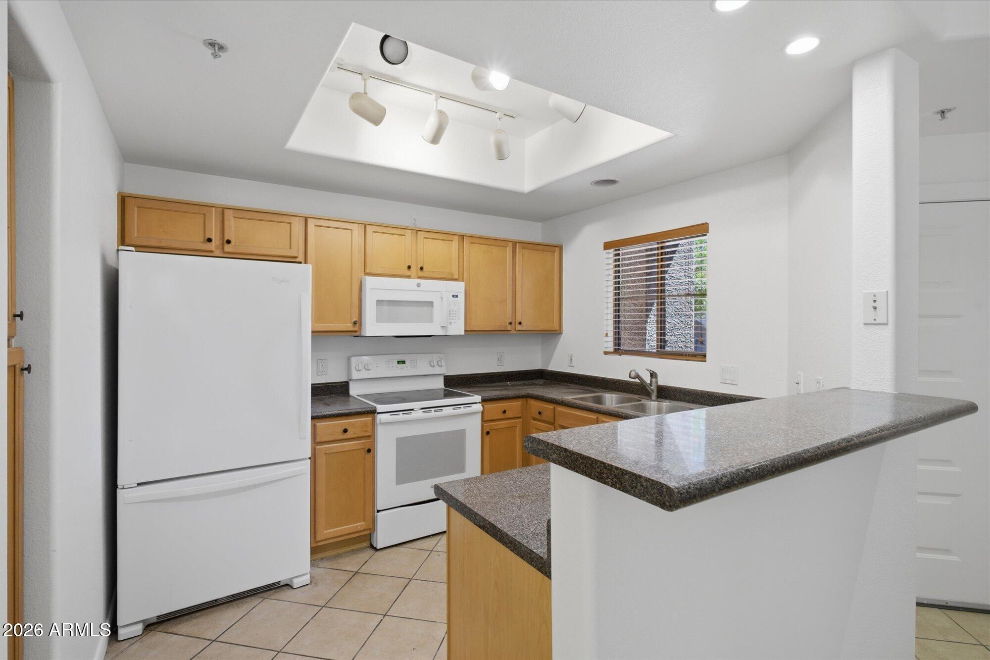 11680 E SAHUARO Drive 1054