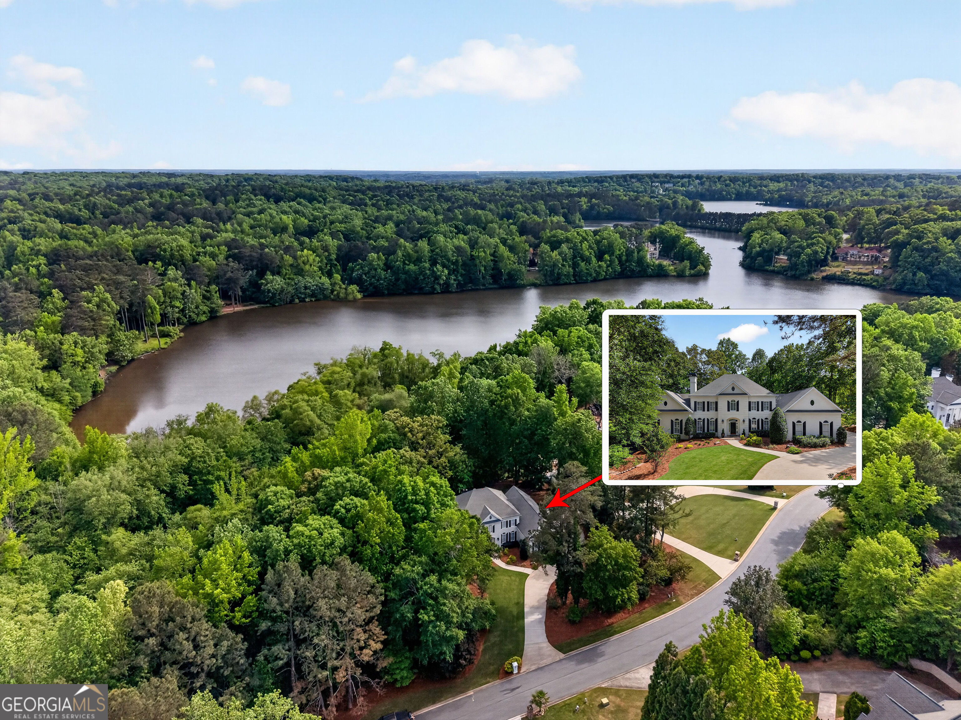 Aerial view of a wooded lakeside home, with an inset showing its front exterior.