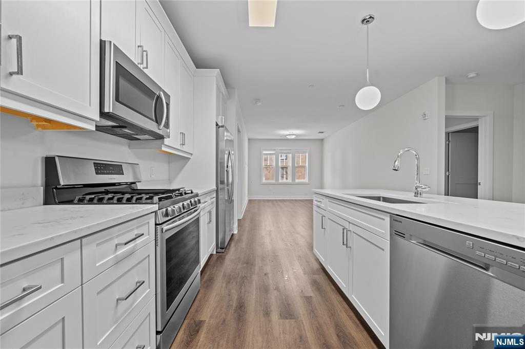 313 Woodland Place 202