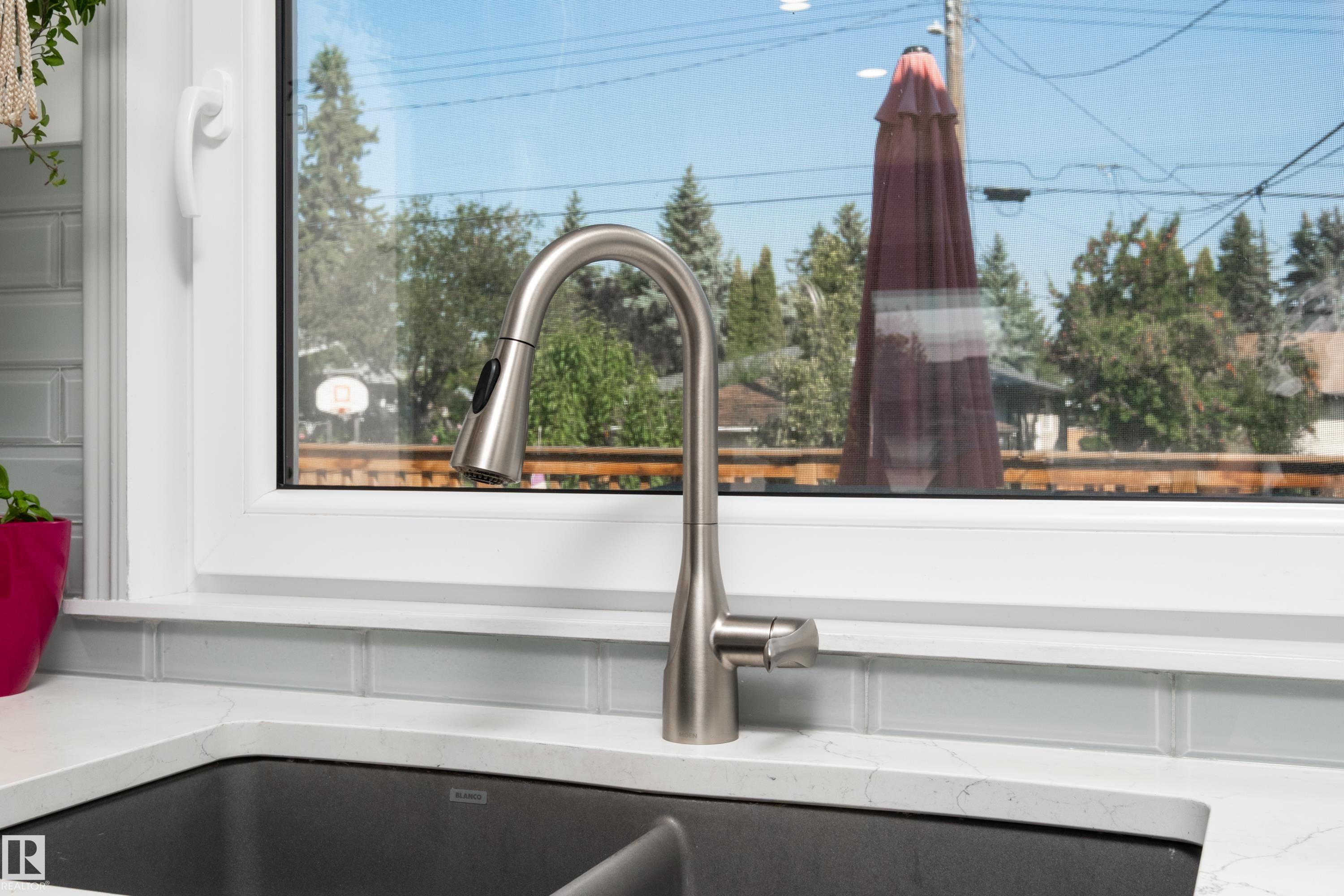 7708 106A AV NW