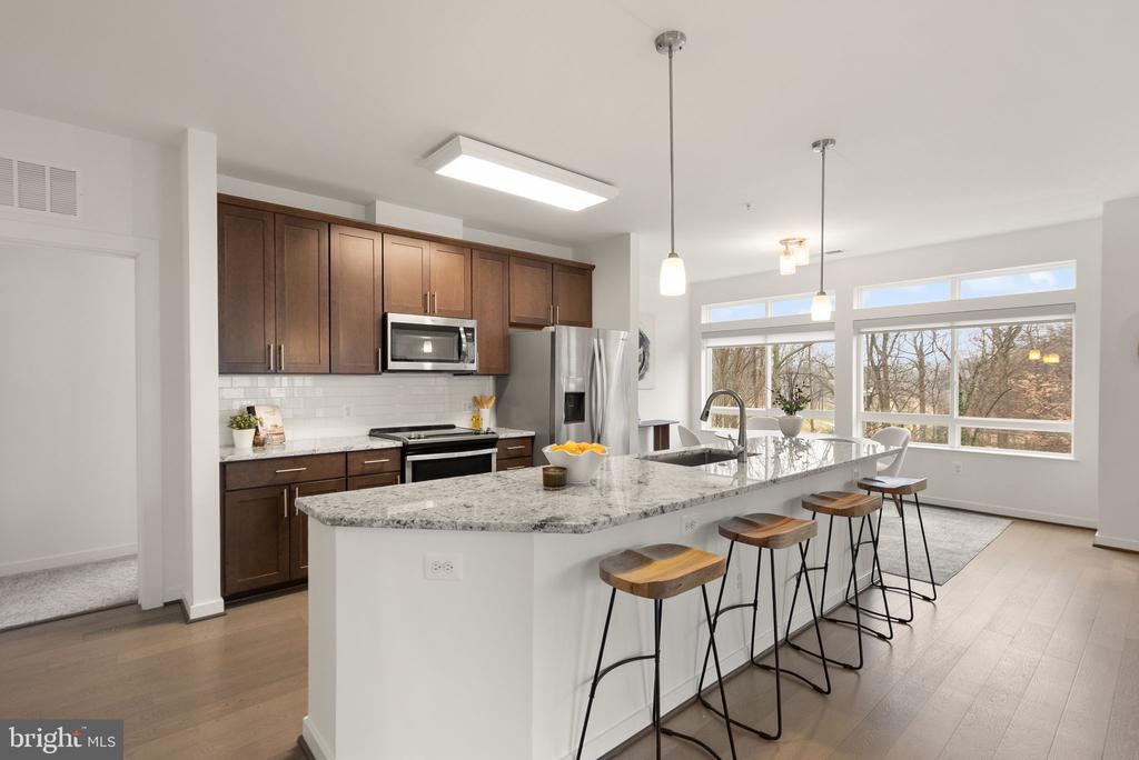 9450 SILVER KING COURT 203