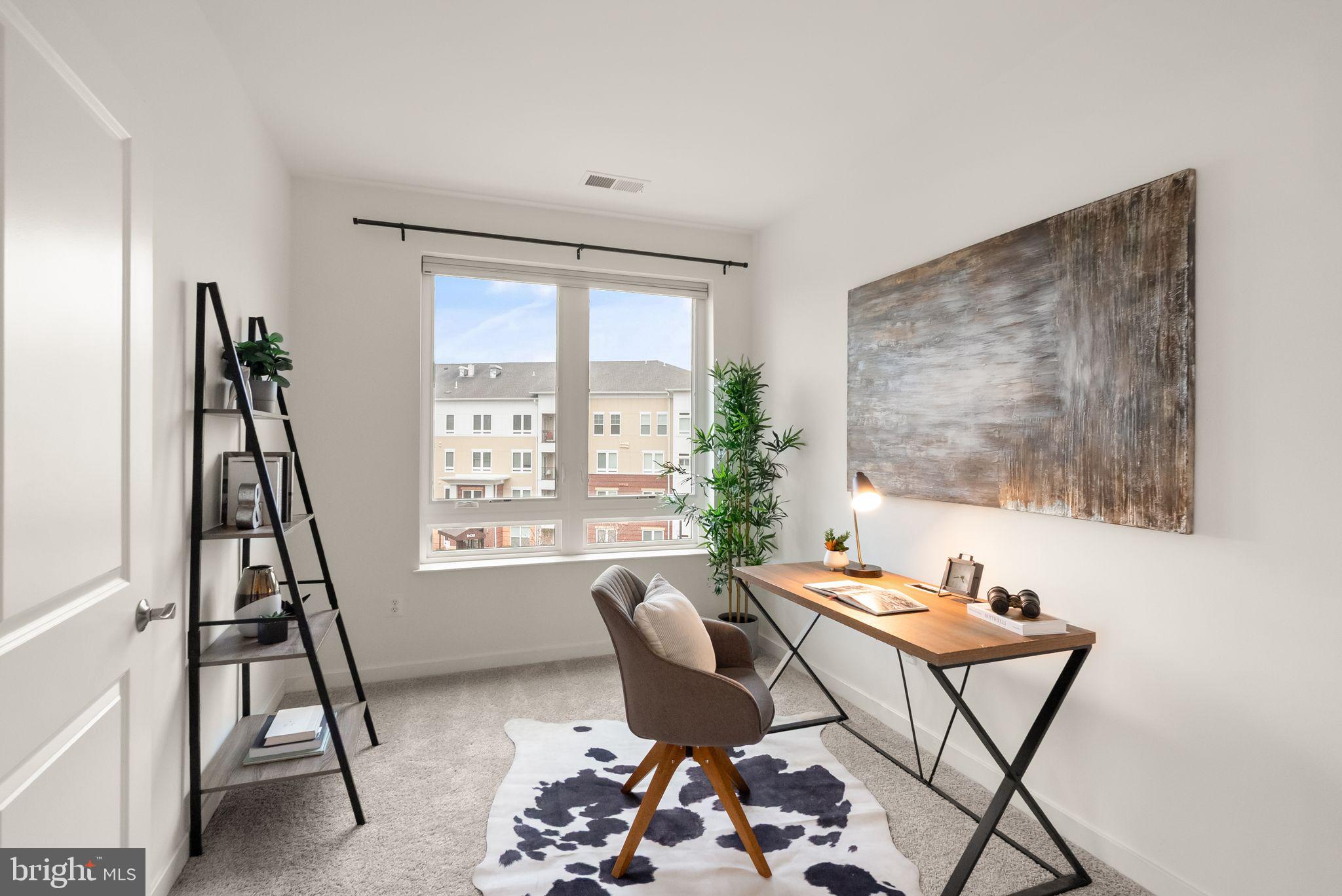 9450 SILVER KING COURT 203