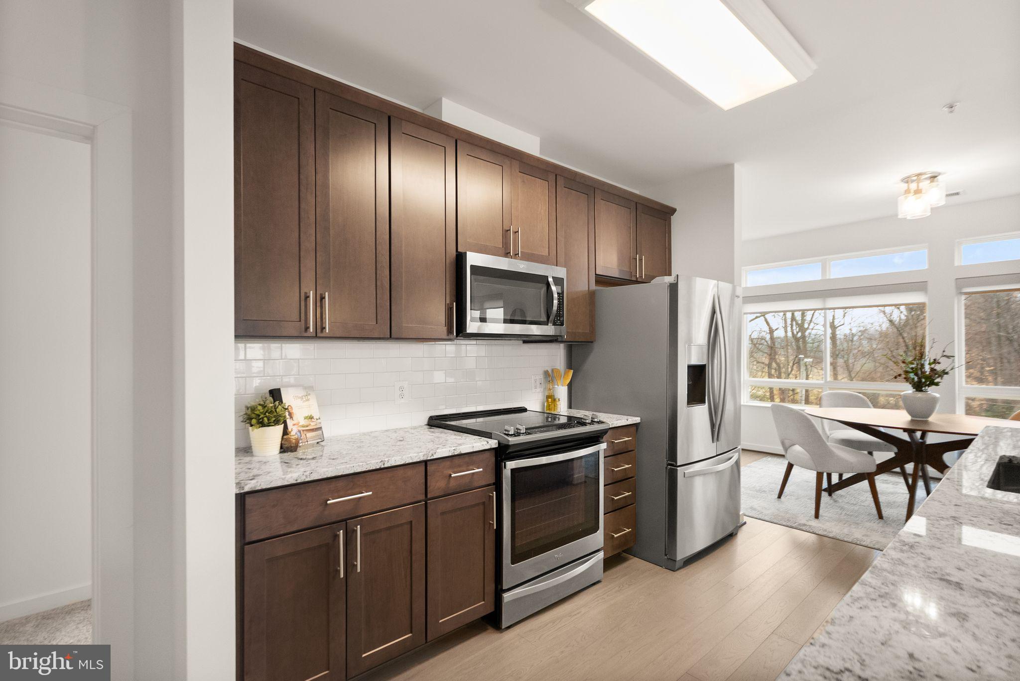 9450 SILVER KING COURT 203