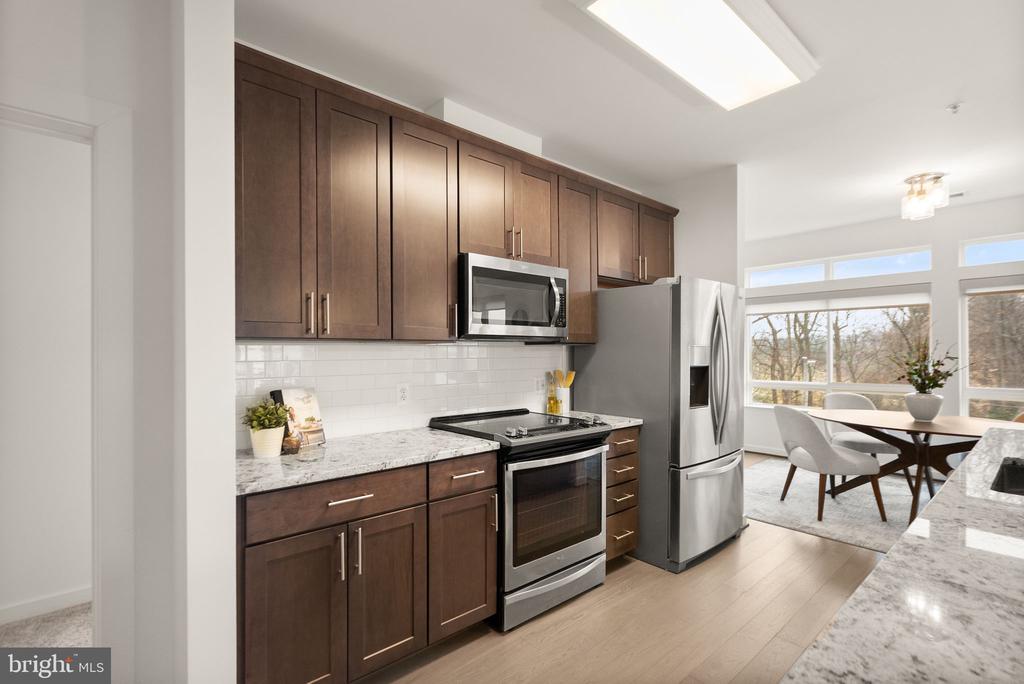 9450 SILVER KING COURT 203