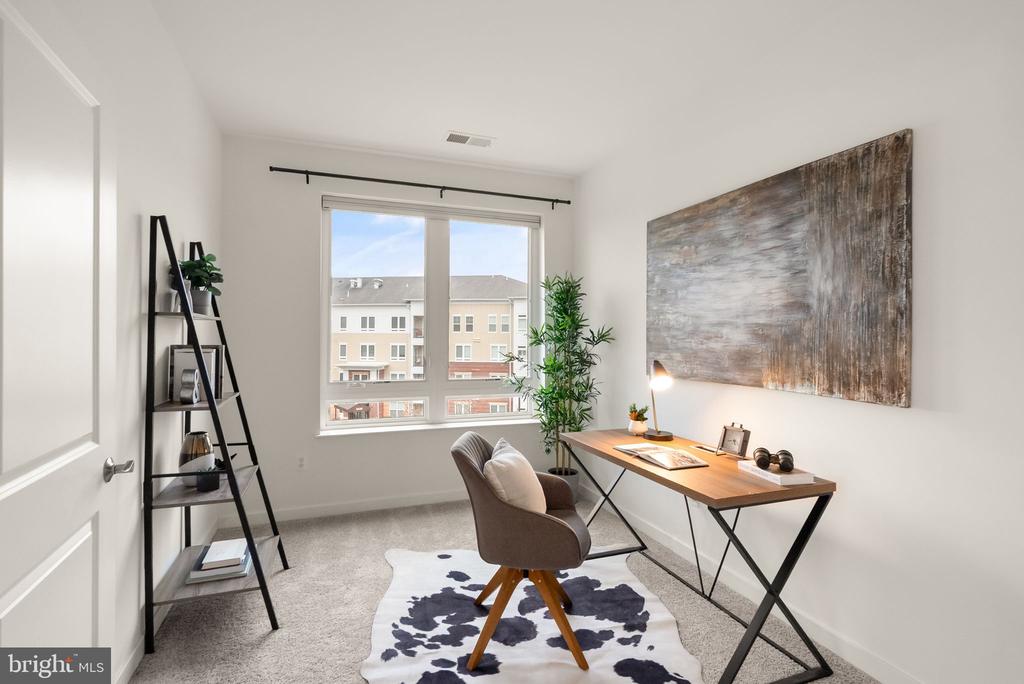9450 SILVER KING COURT 203