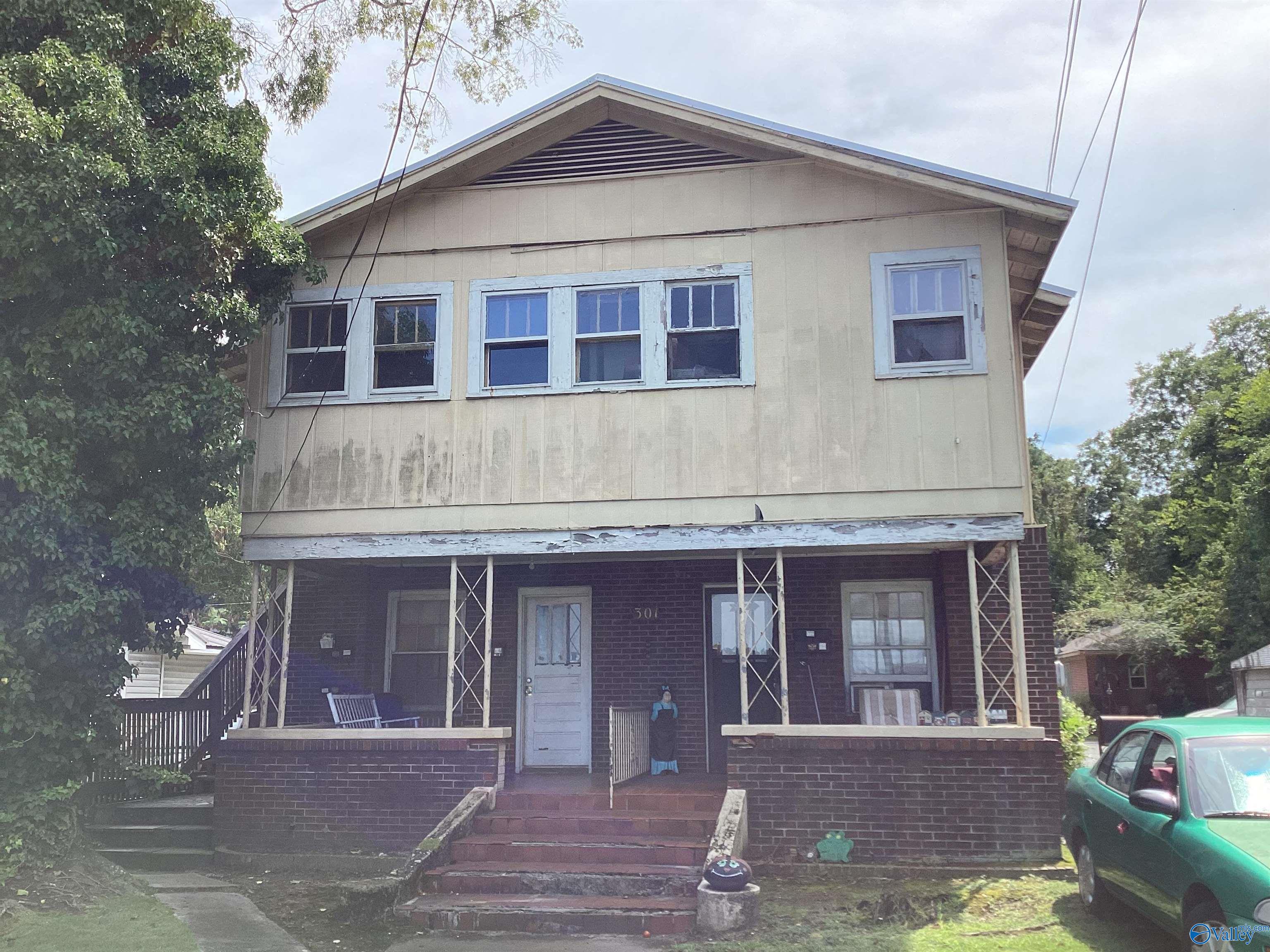 215, 301, 303 Elmwood Avenue