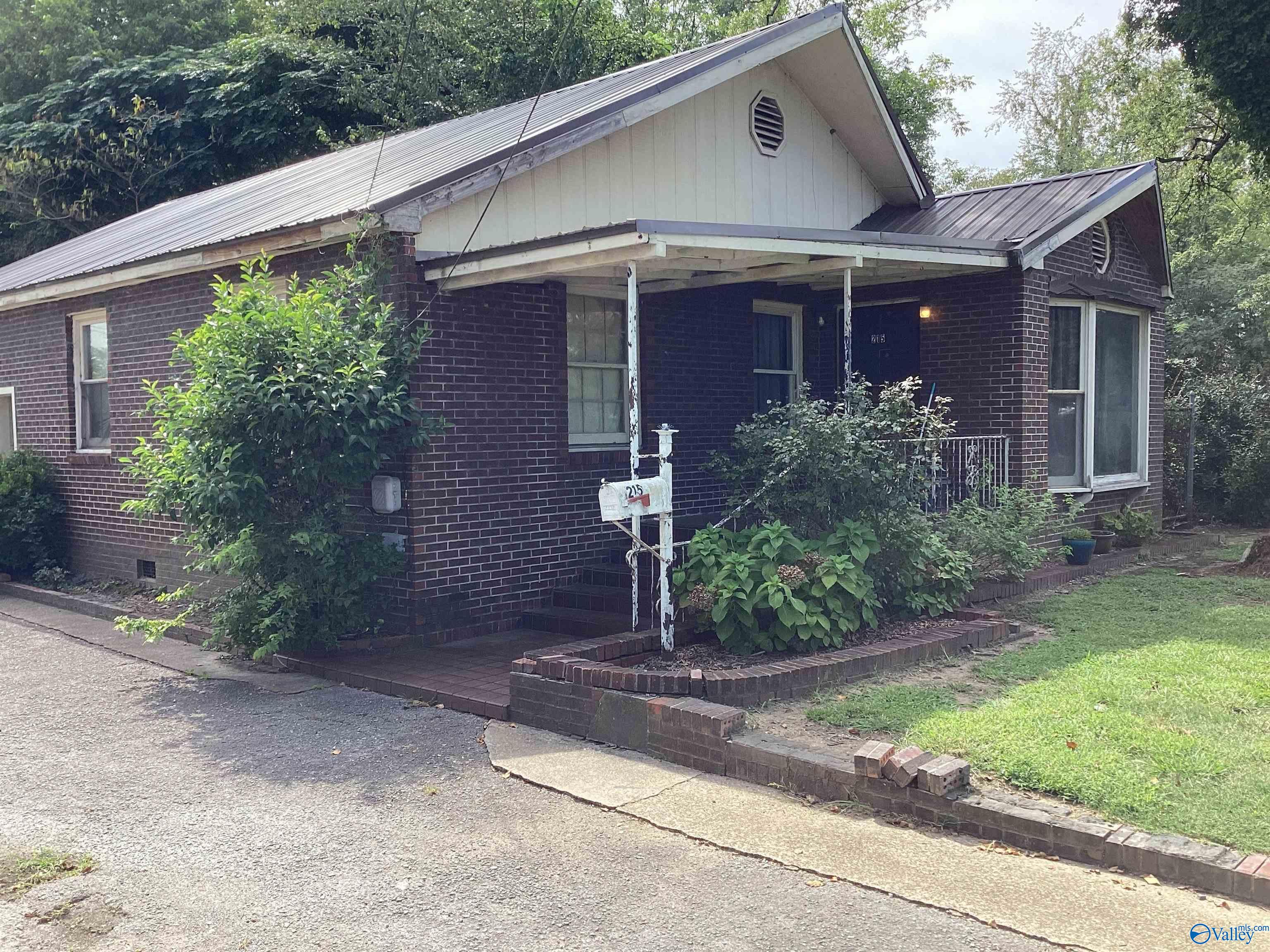 215, 301, 303 Elmwood Avenue