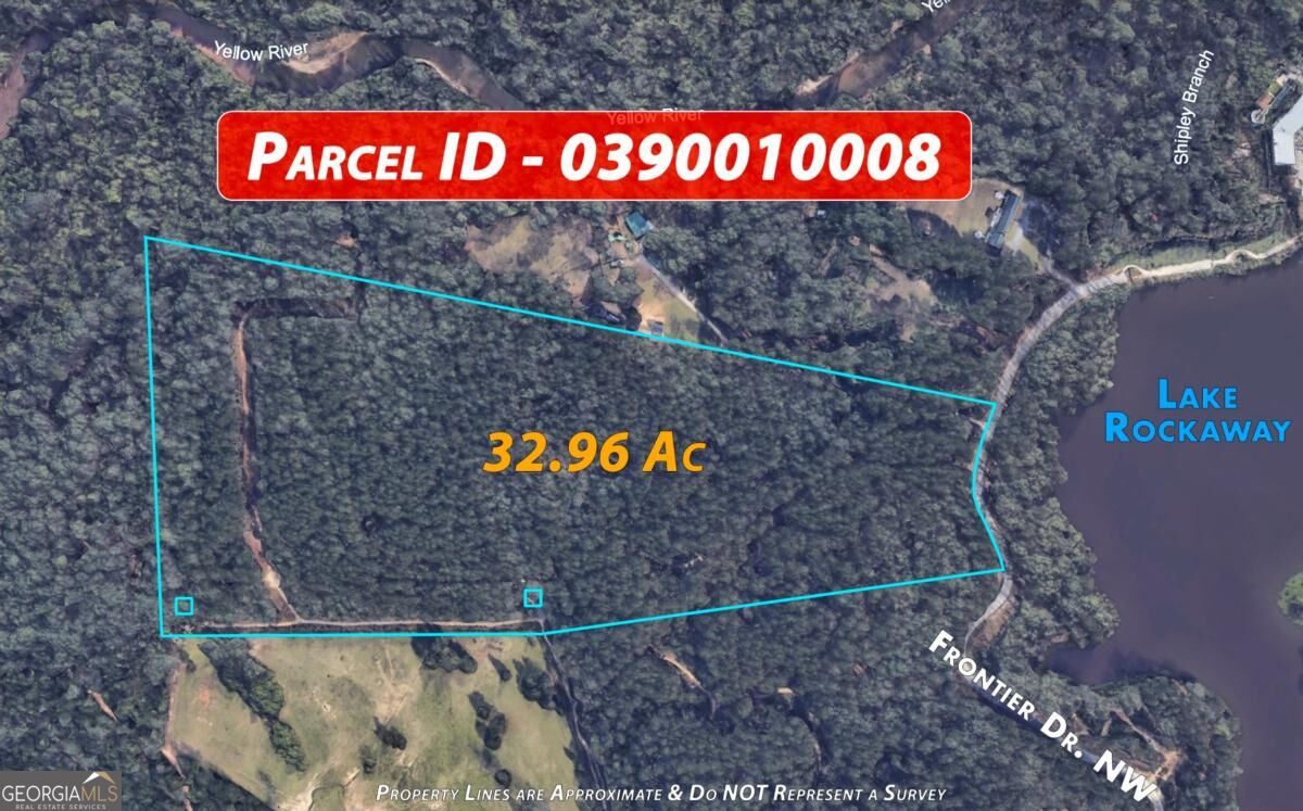 Aerial map of a wooded 32.96-acre parcel outlined beside Lake Rockaway.