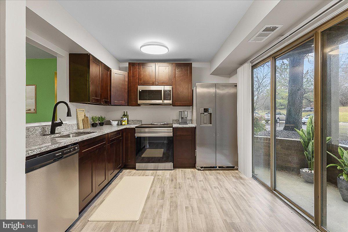 7036 HARBOUR VILLAGE COURT T1