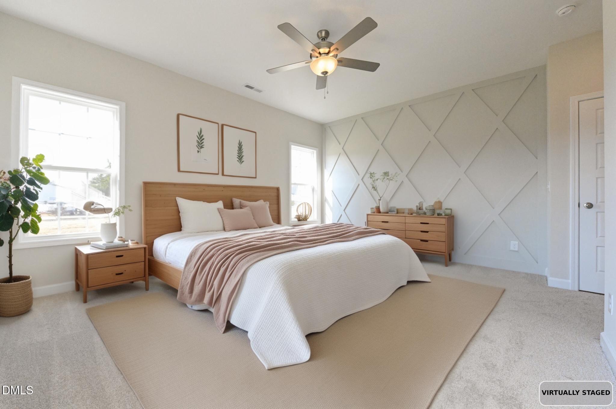Virtually staged bedroom with a wood bed, blush bedding, and geometric accent wall.