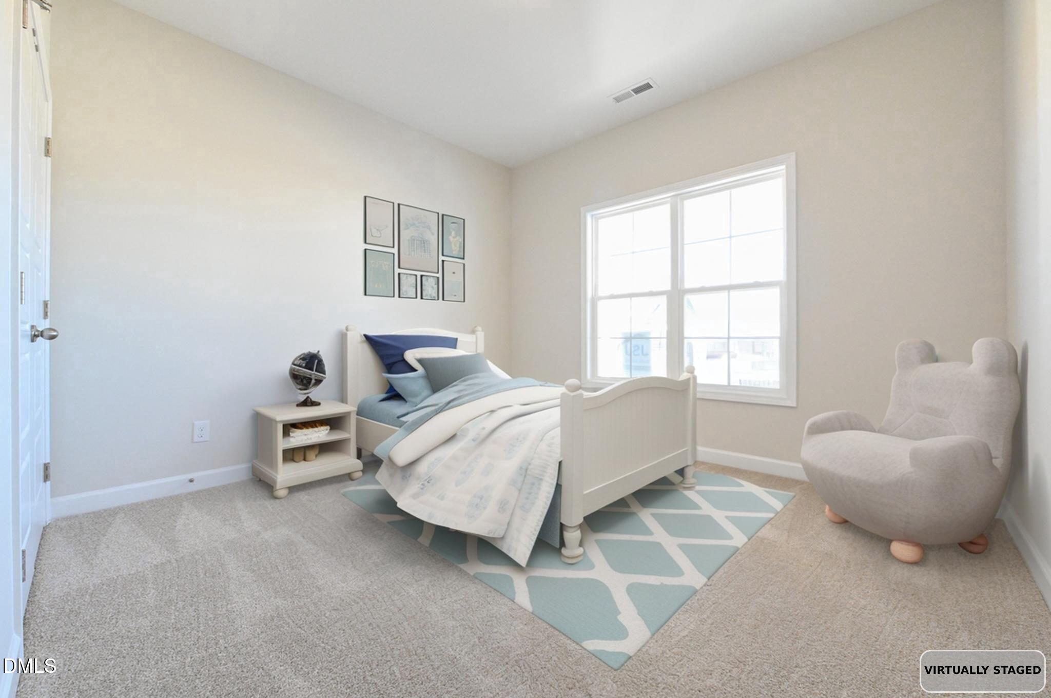 Virtually staged bedroom with a white bed, blue accents, and a bear-shaped chair.