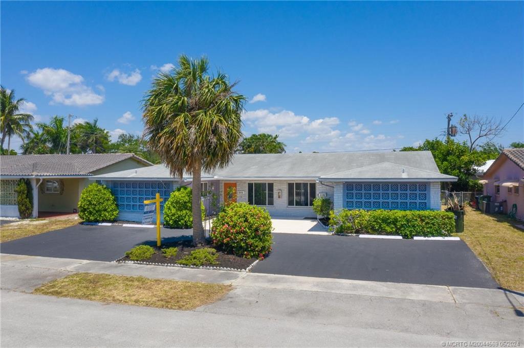 2113-2115 NE 56th Court