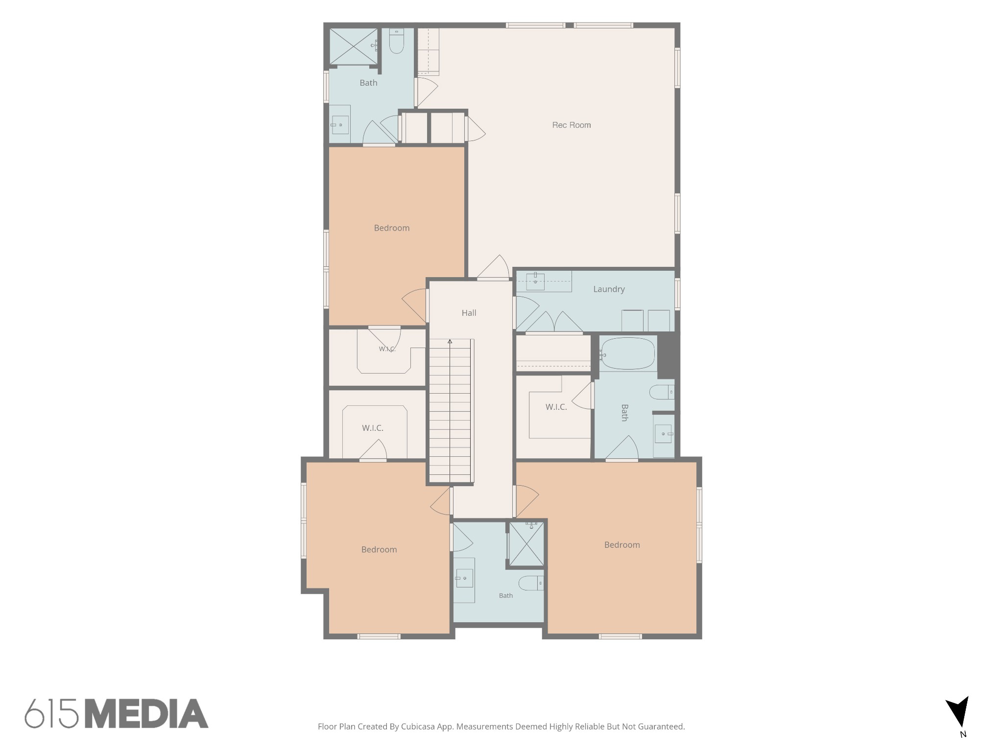 Floor plan showing three bedrooms, three bathrooms, a rec room, laundry, and central hall.