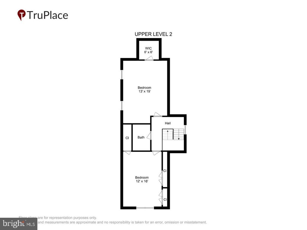 Upper-level floor plan with two bedrooms, a bathroom, hall, stairs, and walk-in closet.