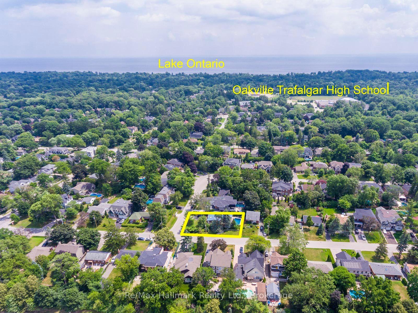Aerial view of the property lot outlined in yellow, with Lake Ontario and Oakville Trafalgar High School labeled in the distance.
