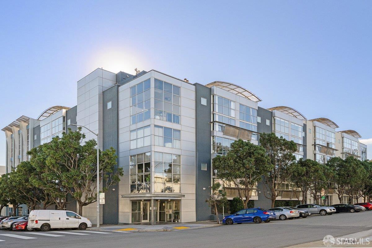 Exterior view of a modern condominium building at 1011 23rd Street in San Francisco’s Dogpatch and Central Waterfront neighborhood, featuring contemporary architecture, large windows, and a prime urban location near Mission Bay and Potrero Hill.