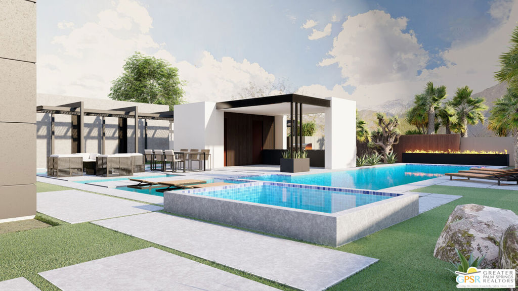 Modern backyard pool and raised spa beside a covered patio, with palms and mountain views.