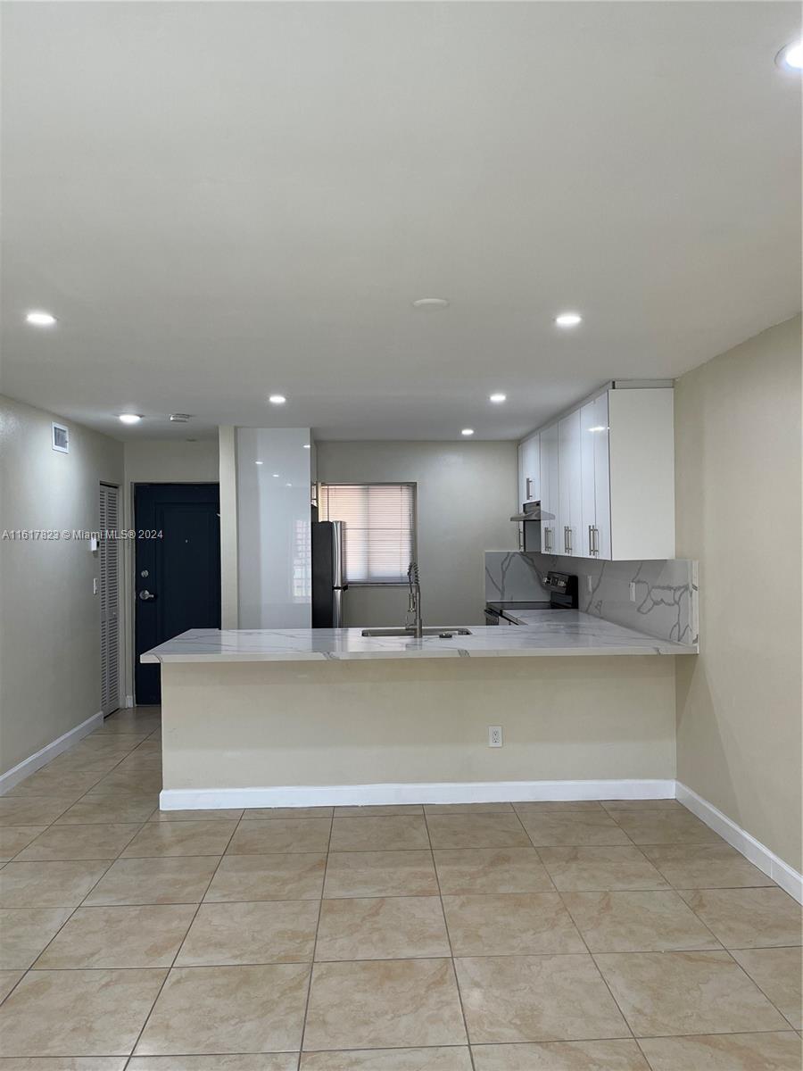 7705 Camino Real # B204