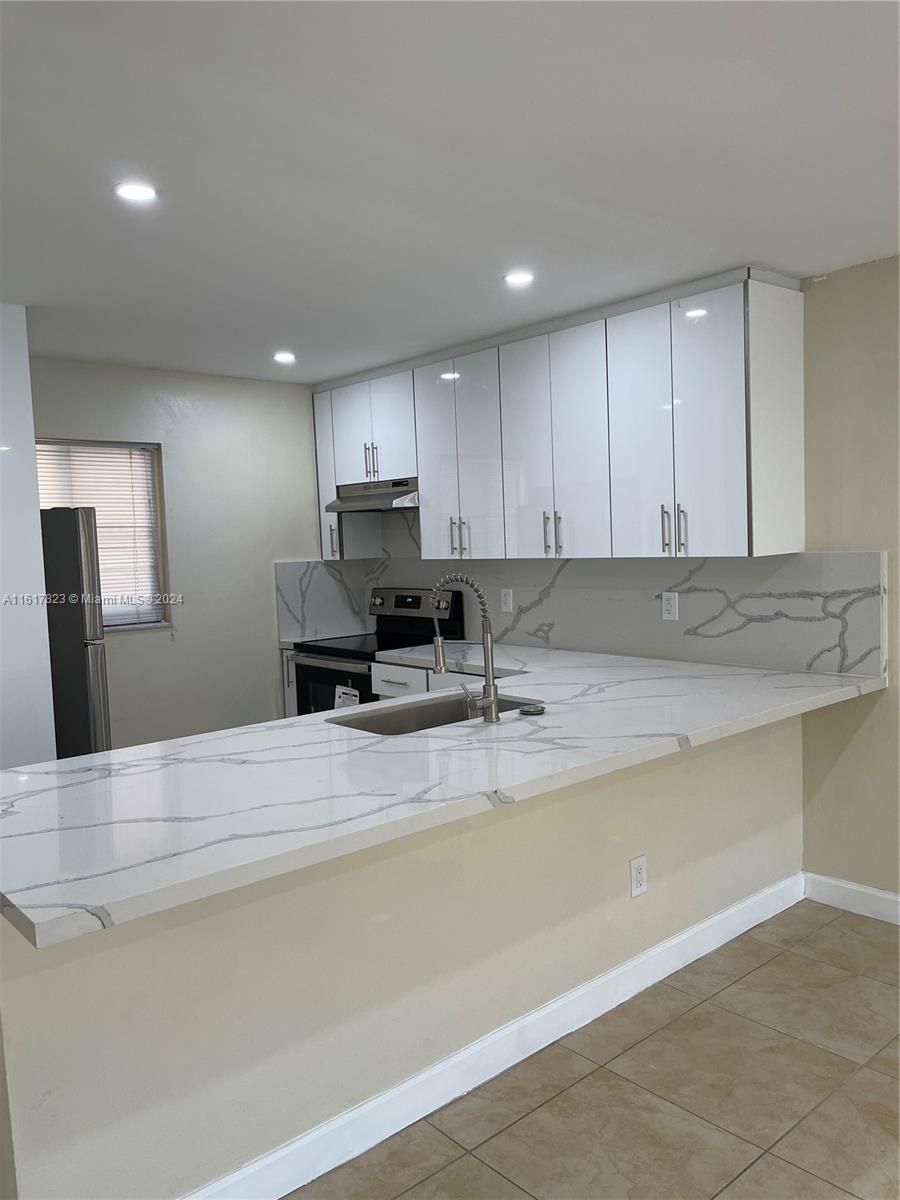 7705 Camino Real # B204