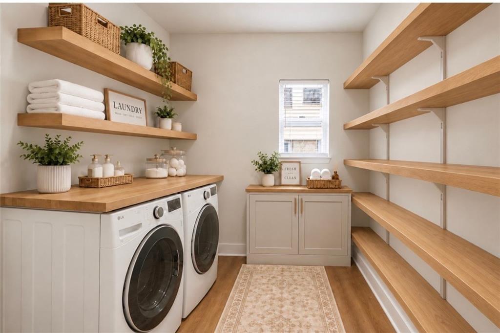 Laundry room with front-loading washer and dryer, wood counters and open shelving.