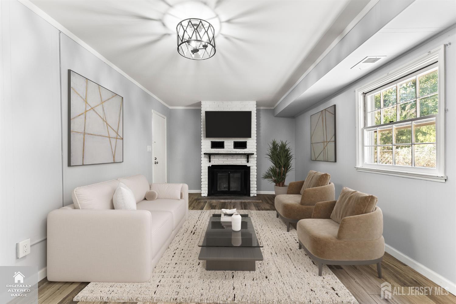 Staged living room with a white brick fireplace, pale sofa, and tan chairs beside a large window.